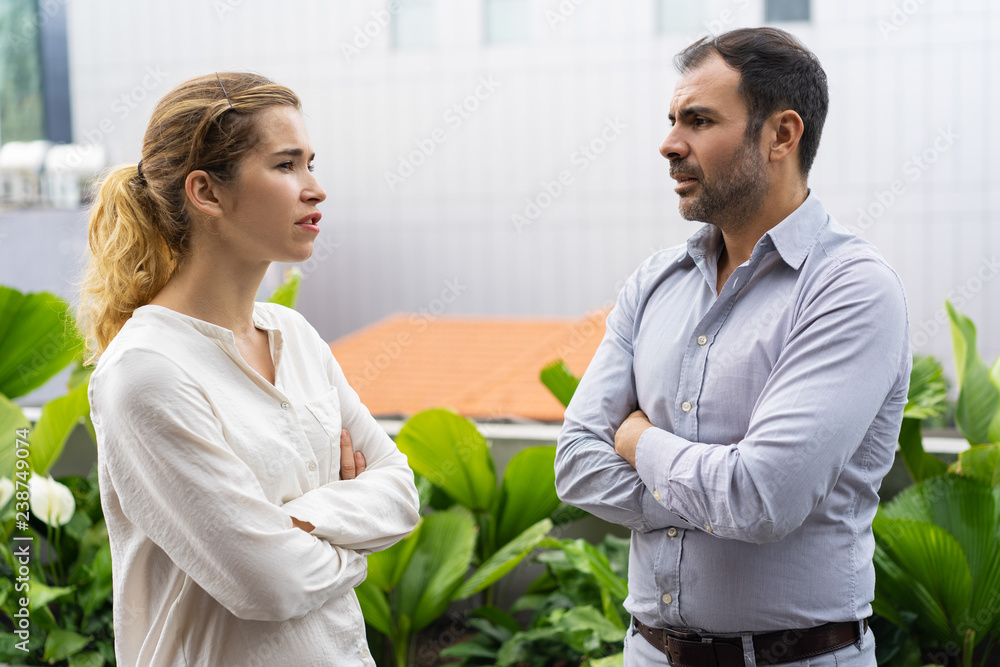 Two Business People Talking To Each Other