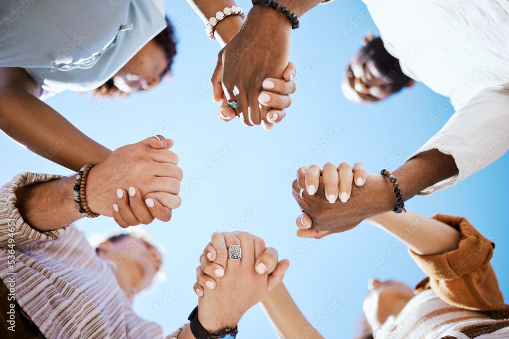 Diversity, Support And People Holding Hands In Trust And Unity For Community Against Sky...
