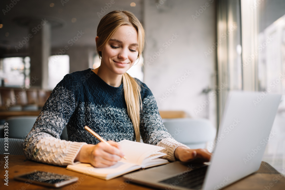 Young Attractive University Student Using Laptop Computer, Studying At Modern Library. Cheerful ...