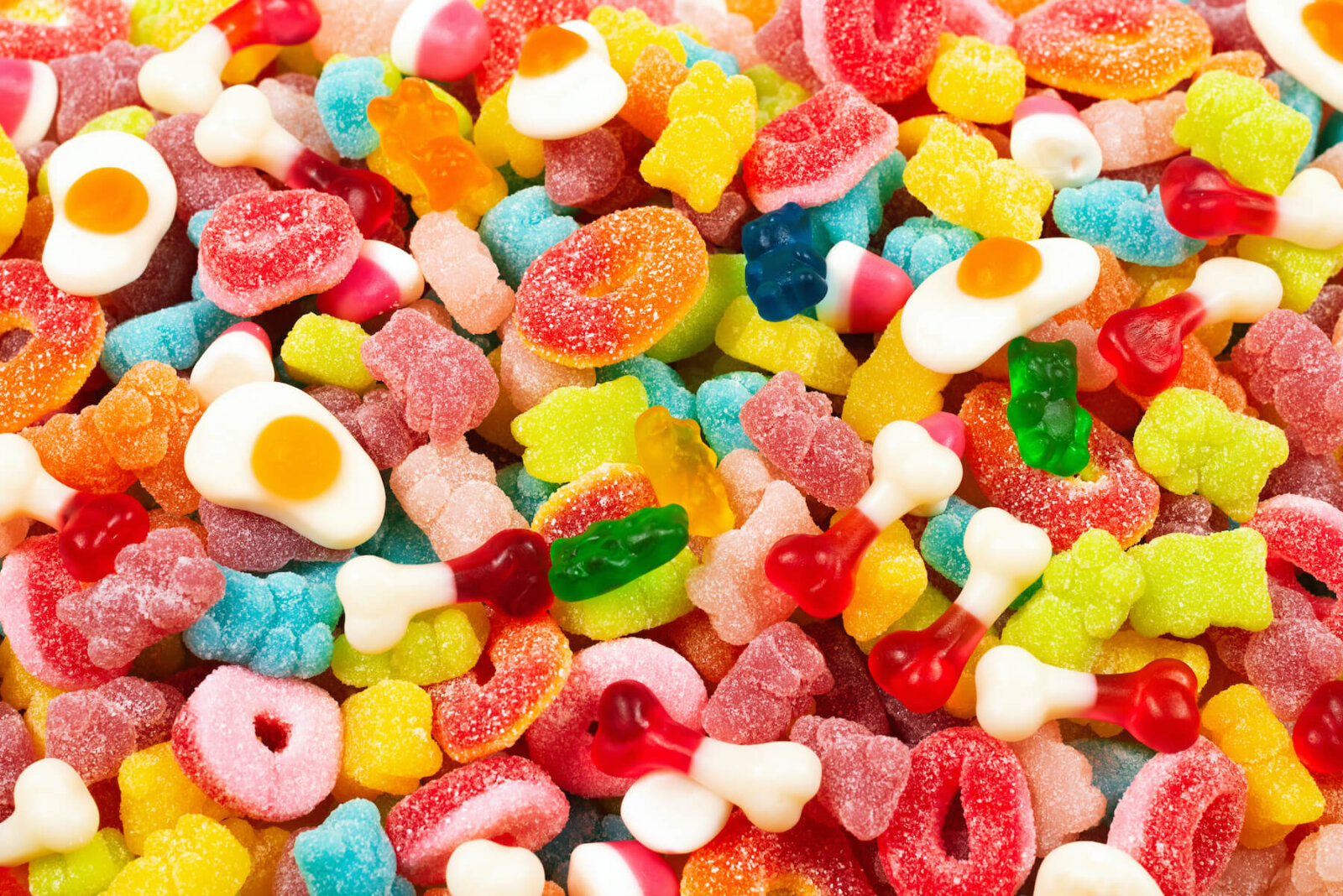 gummies Assorted gummy candies. Top view. Jelly sweets. | Hancock Village Dental | Dentist ...