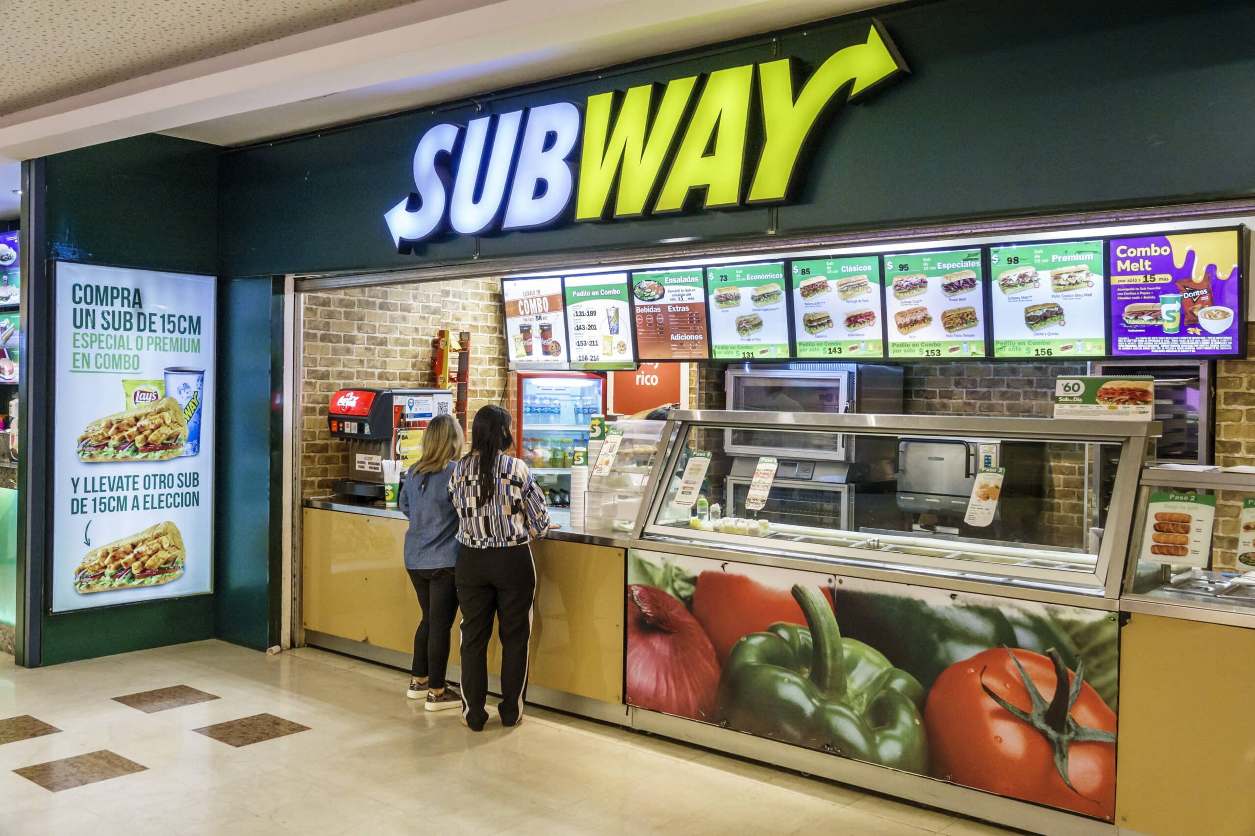 Subway Worker Falls Asleep While In The Middle Of Making A Sandwich.