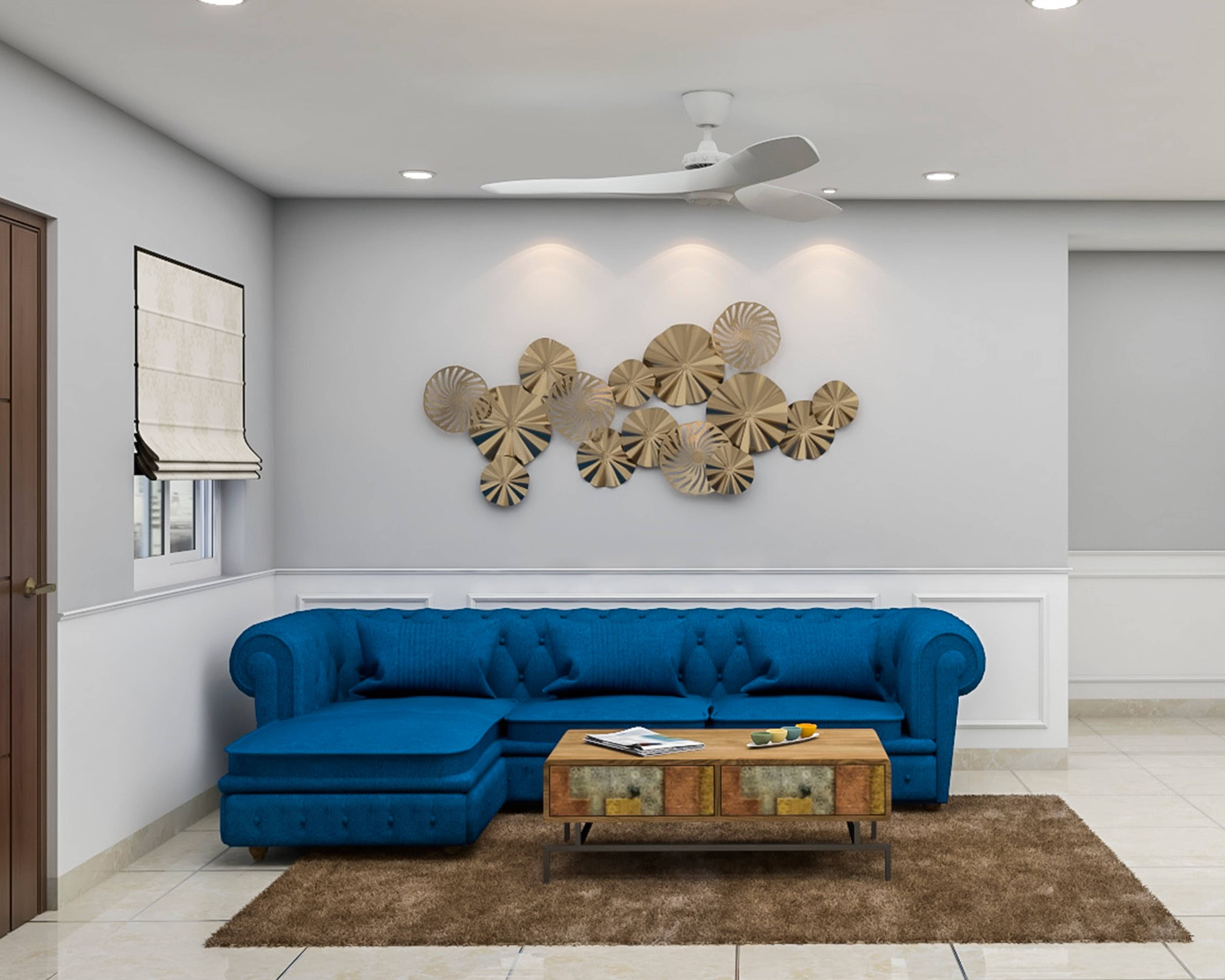 Compact Living Room Design With Blue Sofa| Livspace