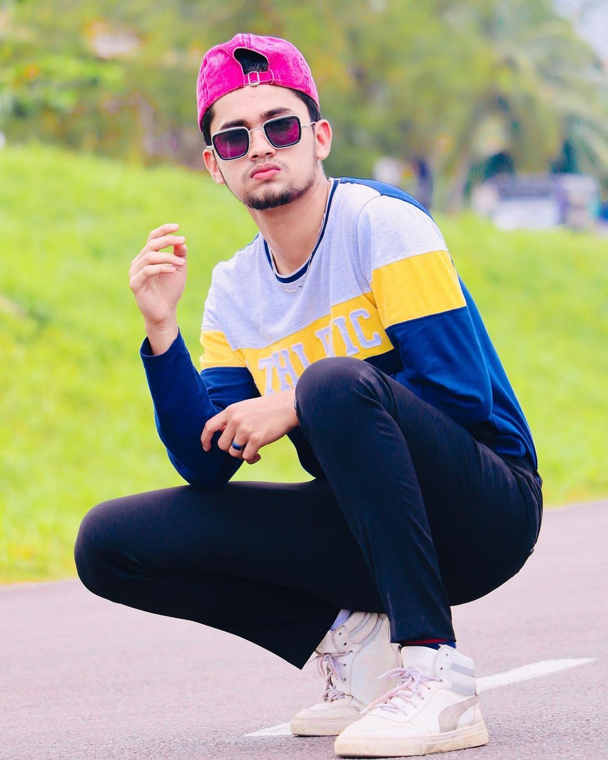 Stylish boy posing on the street - PixaHive