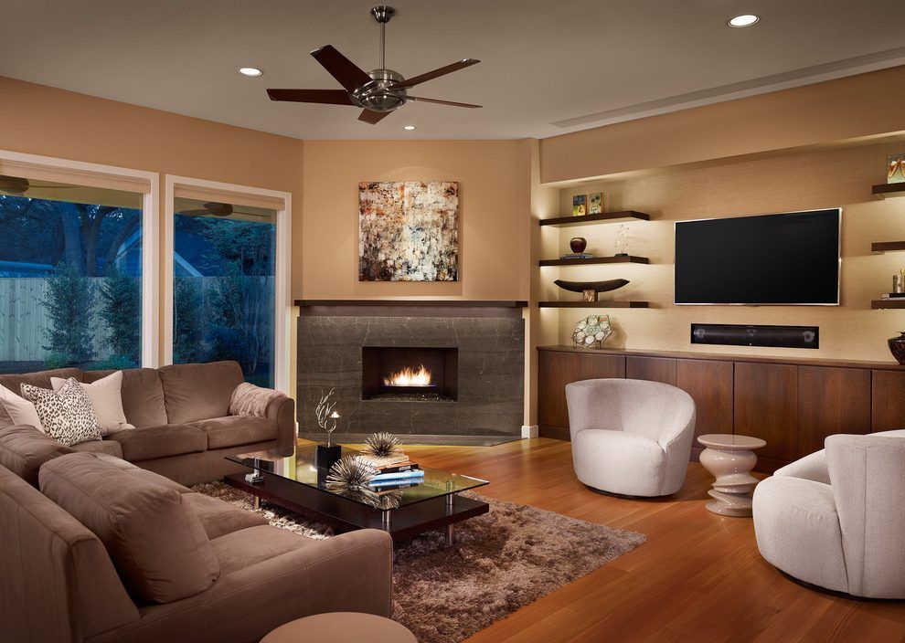 Floating shelves next to fireplace family room contemporary with built i cabinets wood floor ...