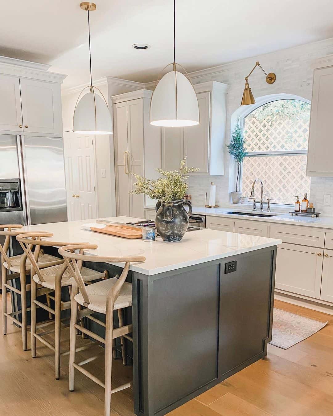 Arched Kitchen Window Between White Cabinets - Soul & Lane